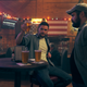 Burton (Jack Reynor) raises a glass in Clanton.